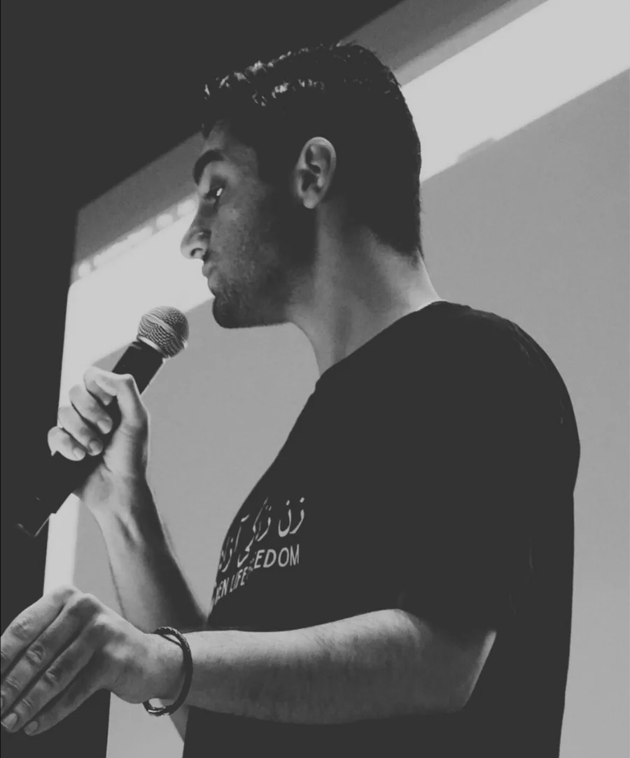 Kamyar speaking at the event